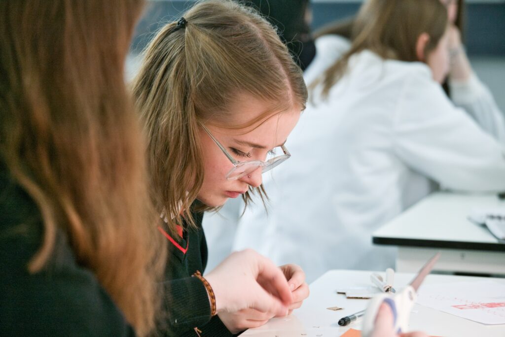 Student connie working in science lab